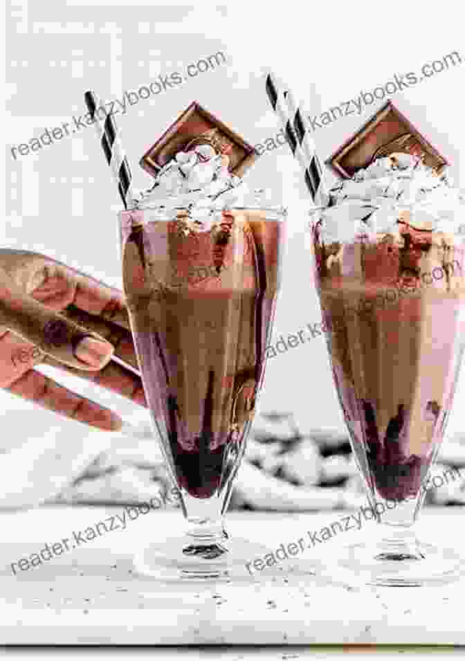 A Decadent Chocolate Boozy Milkshake Adorned With Chocolate Shavings And A Drizzle Of Caramel Sauce Homemade Boozy Milkshake Recipes: Easy To Make Alcoholic Milkshakes