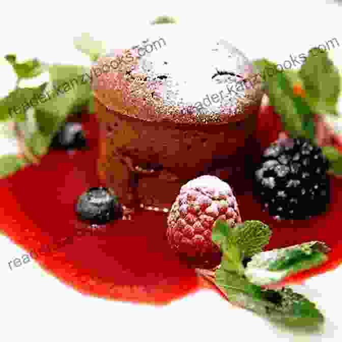 A Decadent Dark Chocolate And Raspberry Fondant Served On A Plate With A Dusting Of Cocoa Powder Good Food: Low Fat Feasts (BBC Good Food)