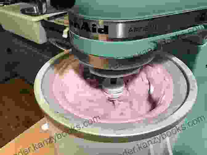 A Person Churning Ice Cream In An Ice Cream Maker Ice Cream Cookbook: How To Make Creamy Scoopable Ice Cream At Home