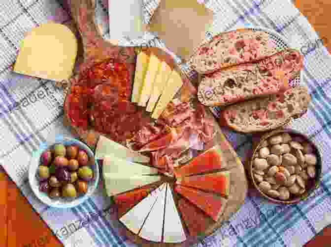 A Photo Of A Cutting Board Filled With A Variety Of Spanish Cheeses And Cured Meats Original Tapas Cookbook For Everyone: Prepare Authentic Spanish Tapas With The Help Of This Cookbook